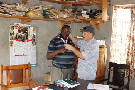 Mike Perry brings "Good Food Awards" medal to Kenya