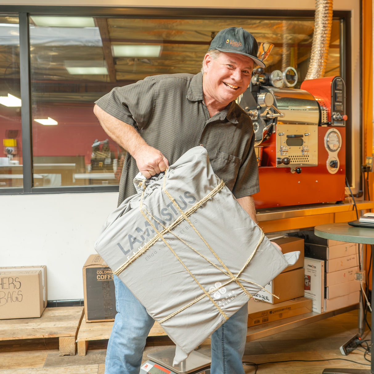 Mike holding box of Panama Geisha from Lamastus Estate